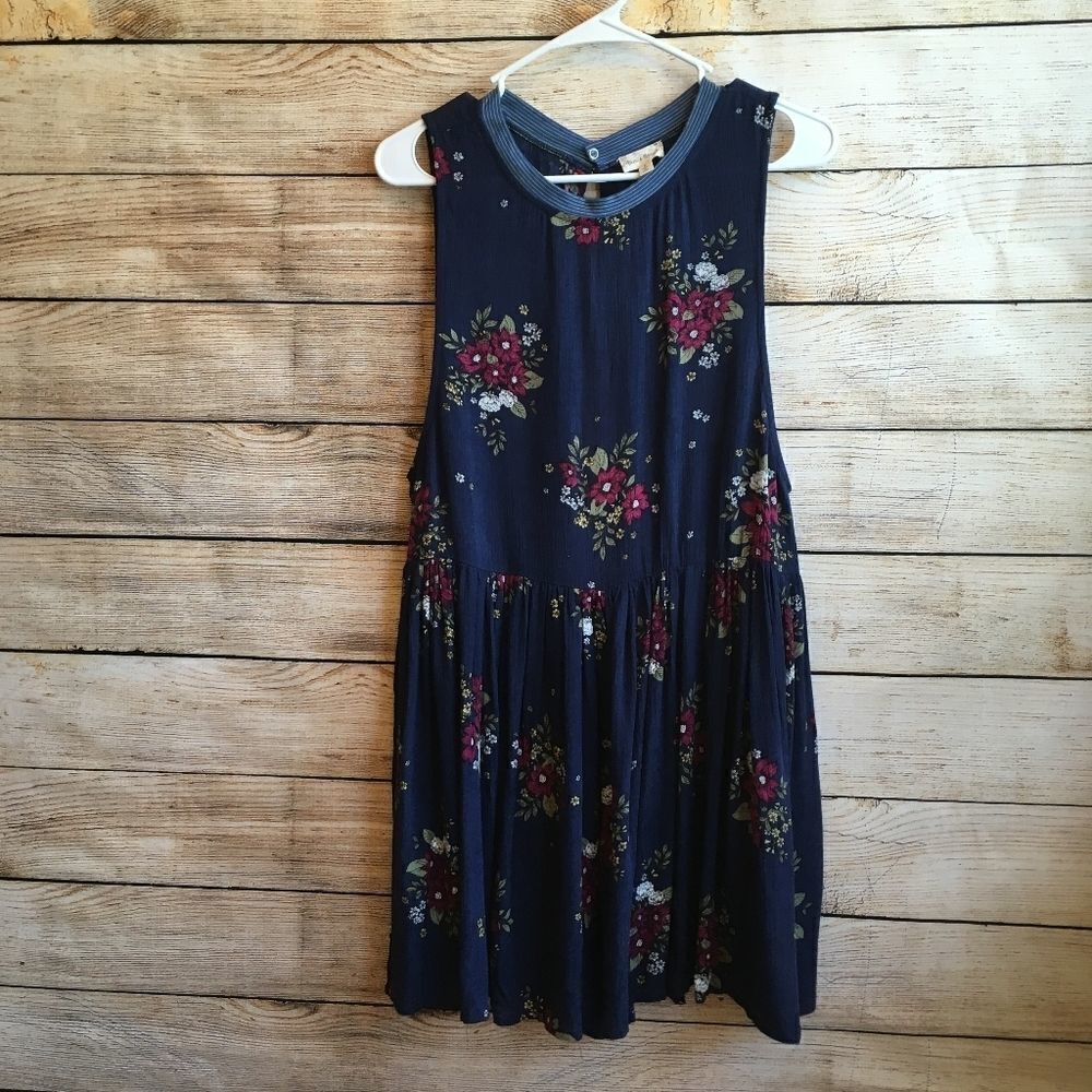 HEM & THREAD ROMPER IN NAVY BLUE FLORAL PRINT